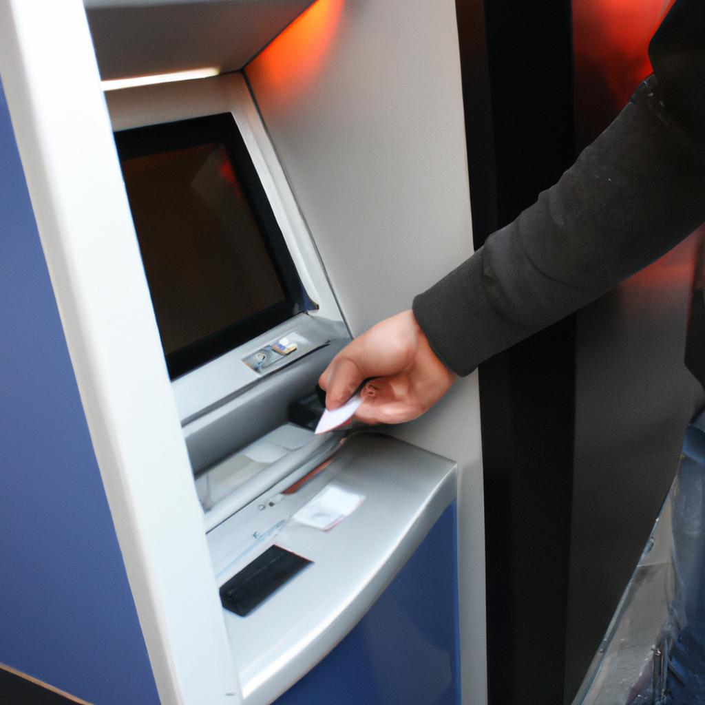 Person depositing check at ATM